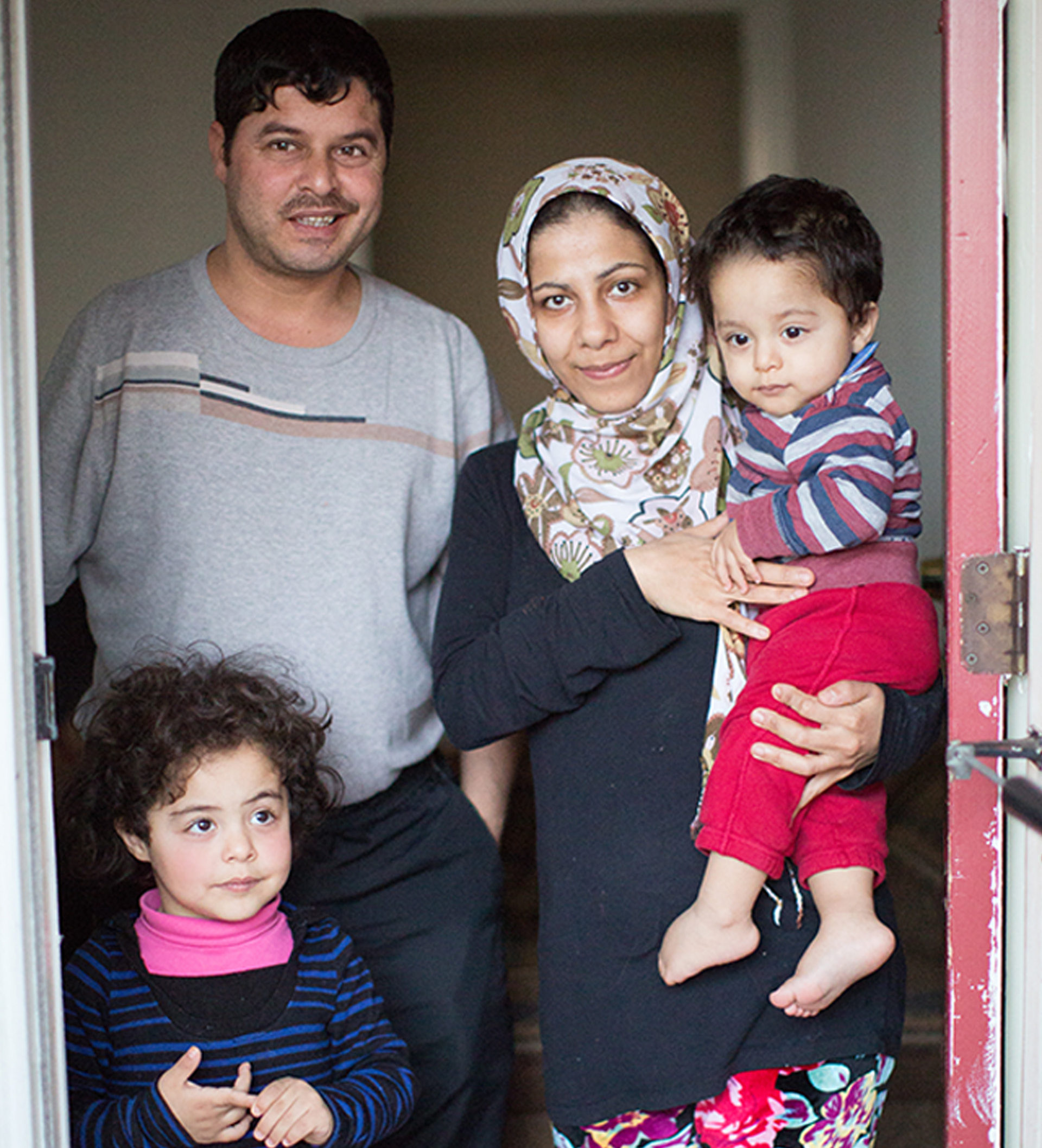 Family in a doorway